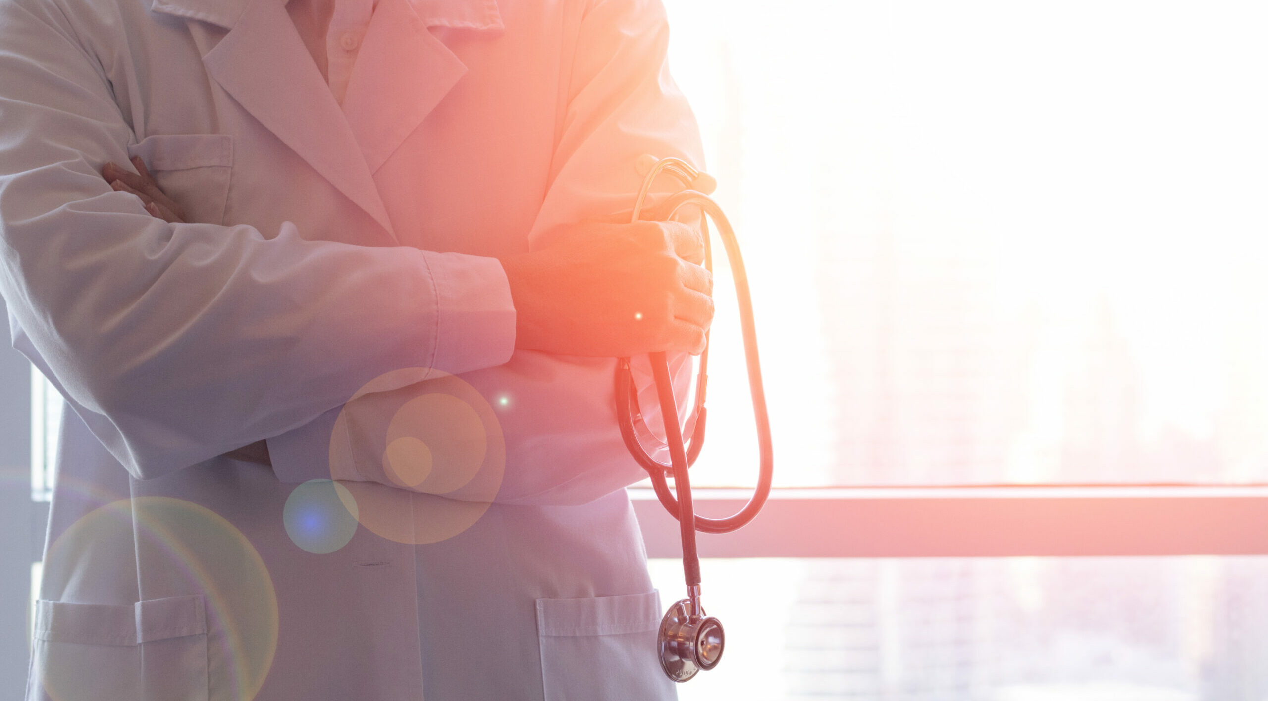 Commentary 10 Doctor holding stethoscope